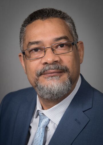 head shot of Elmo Deslandes, PA-C